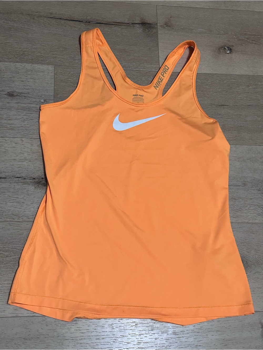 Nike Women's Orange Racerback Tank with White Swoosh